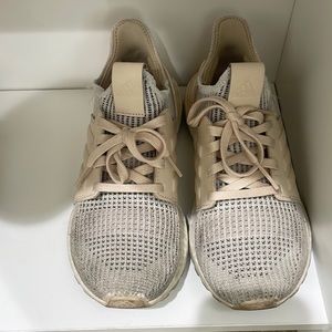 Womens adidas ultra boost in white/ light pink colors.